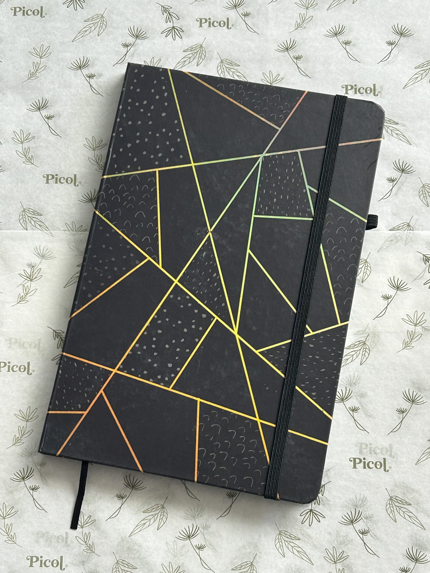 Libreta raya triangulos negros  14x21.5 pasta dura